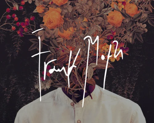 Fall flower wall art in black, orange, and brown with Frank Moth signature in white